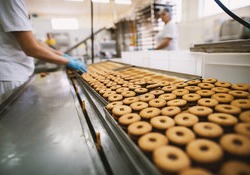 Food production line with worker