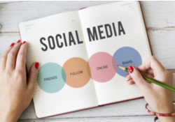 Notebook with social media written down