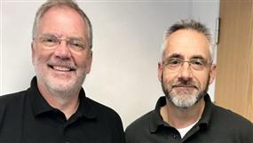 Chris Pollard, left, with Ewen Huffman, the lead chaplain at Hinkley Point C