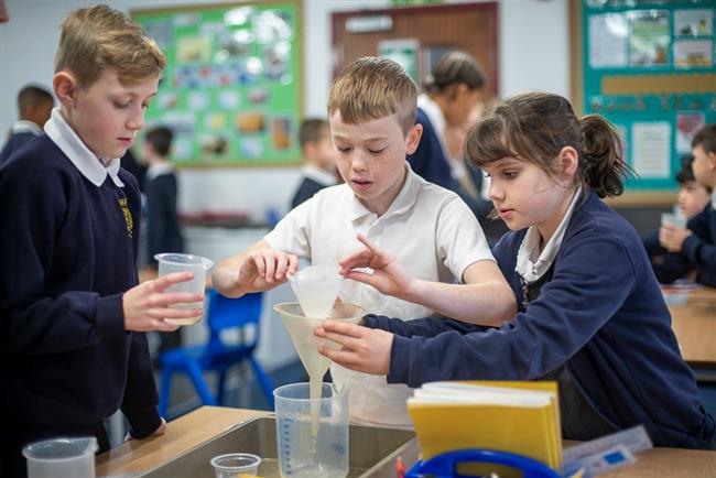 Two students in science class